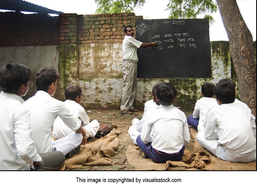 40-50 Years ; Adult Man ; Alphabet ; Blackboard ; 