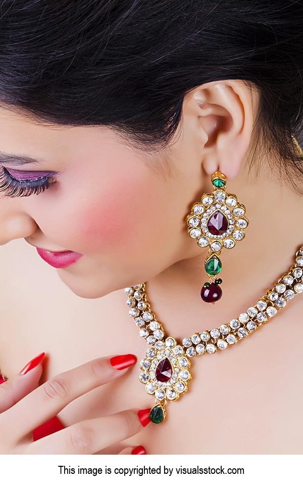 Beautiful woman wearing Necklace And Earring Jewel