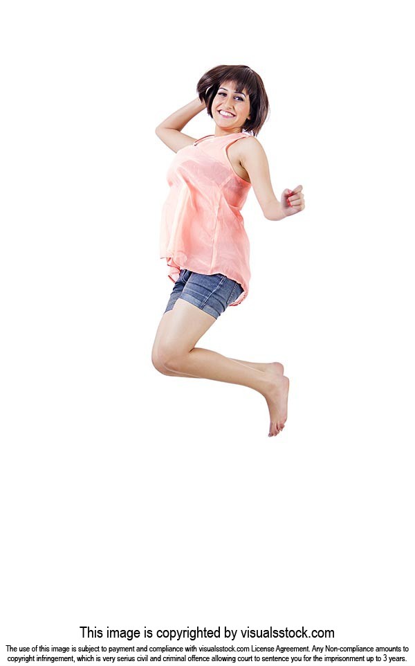 Happy Beautiful Young Woman Jumping Cheerful