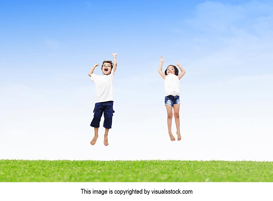 2 People ; Arms Raised ; Barefoot ; Boys ; Brother