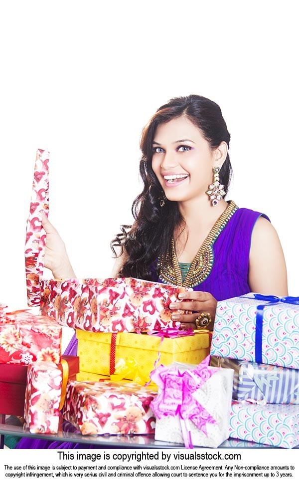 Indian Lady Opening Gifts Diwali