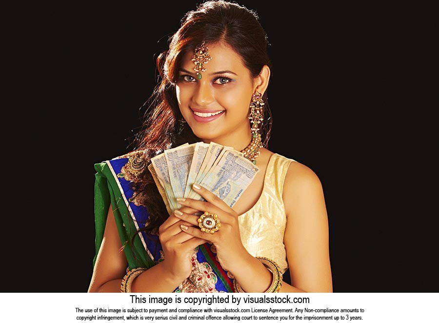 Woman Holding Indian Currency