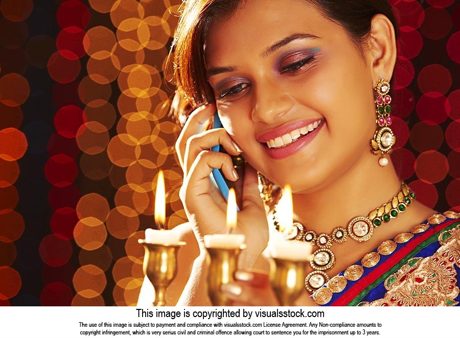 Woman Diwali Lamp Talking Phone