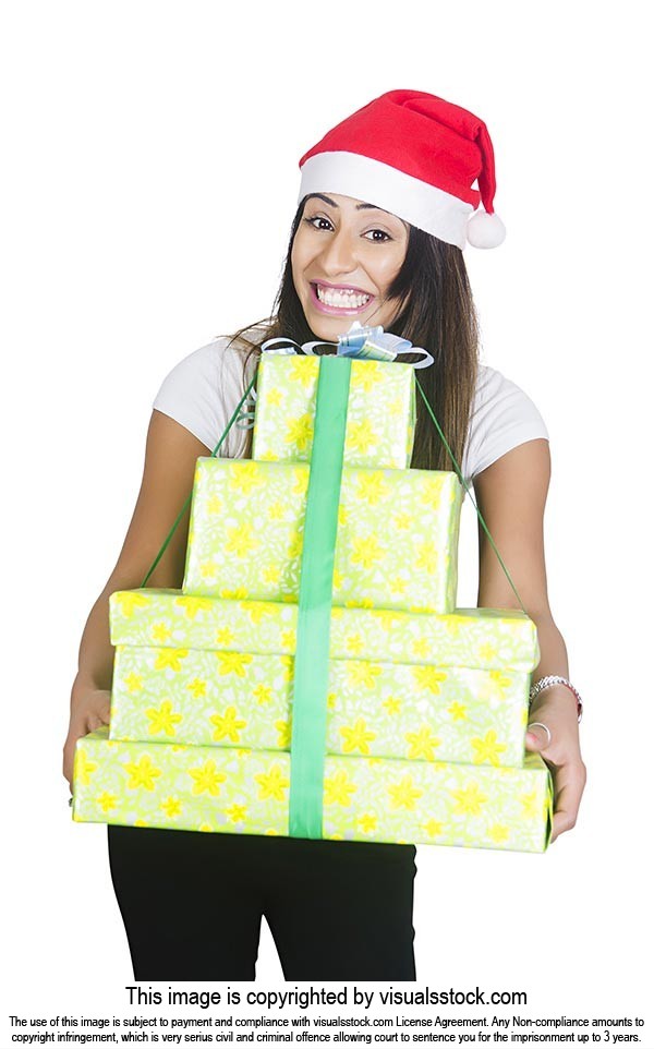 Woman Wrapped gift box Showing Christmas Celebrati