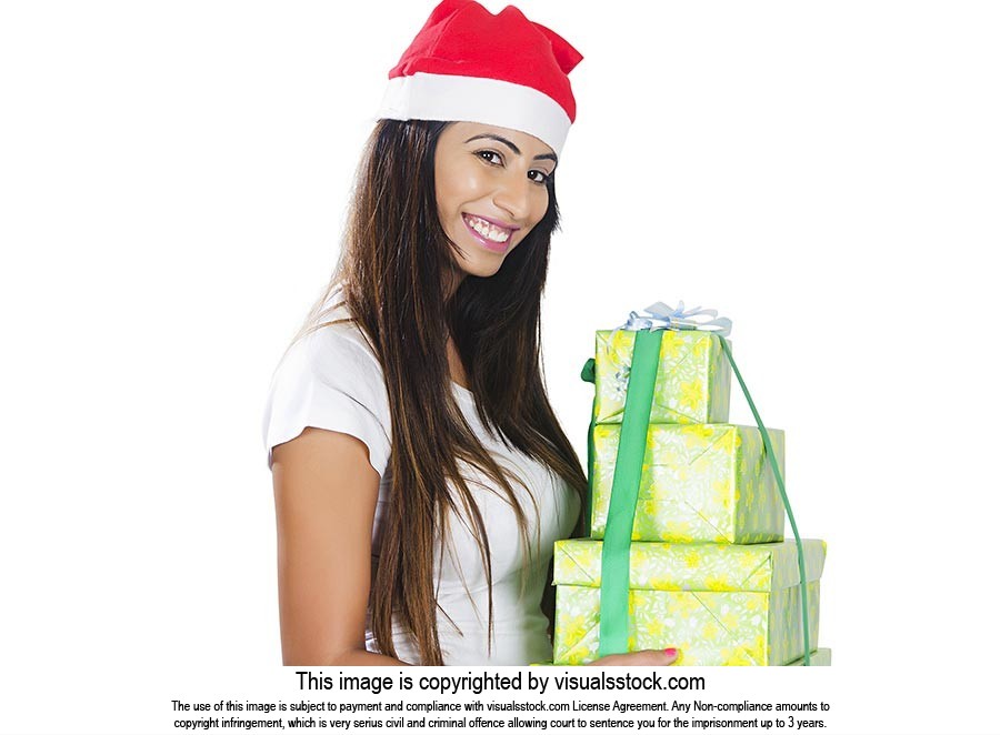 Indian woman showing christmas gifts Smiling
