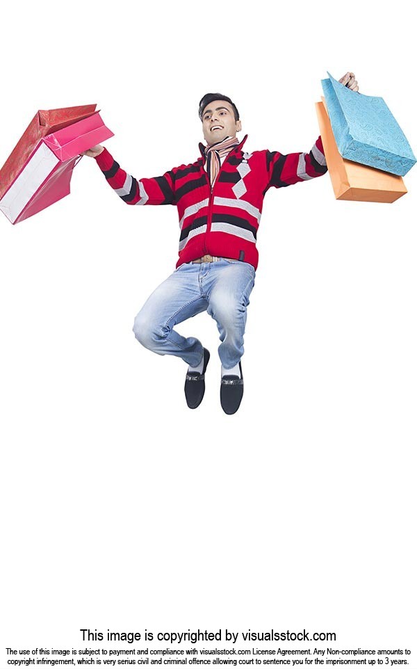 Man Winter Clothes jumping shopping bags Cheerful