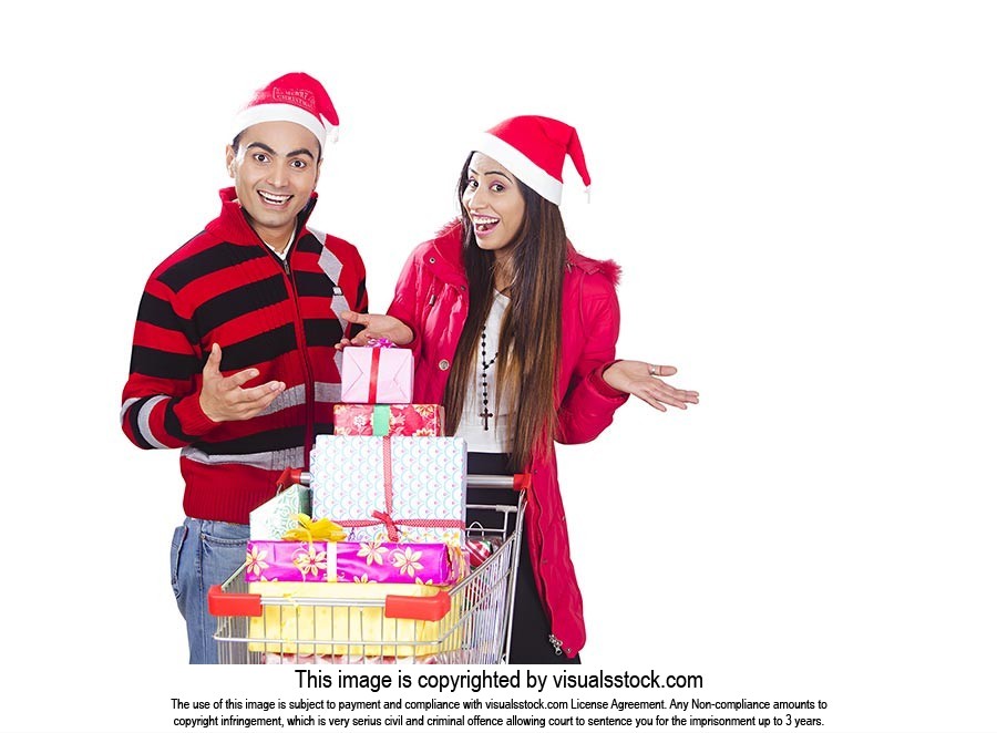 Excited Couple christmas shopping gift Trolley Fun