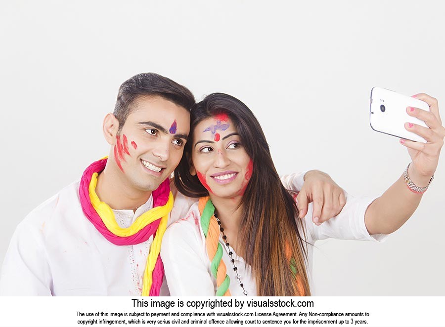 Couple Holi Celebrating Enjoy Taking Phone Selfie