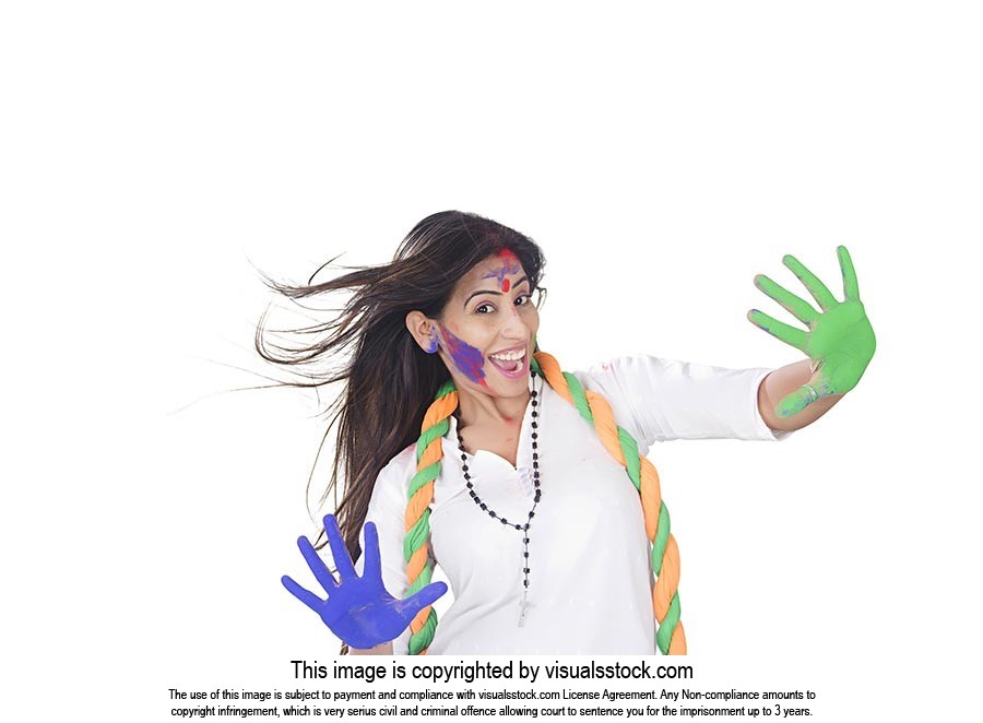 Excited Woman showing colored hands Holi Celebrati
