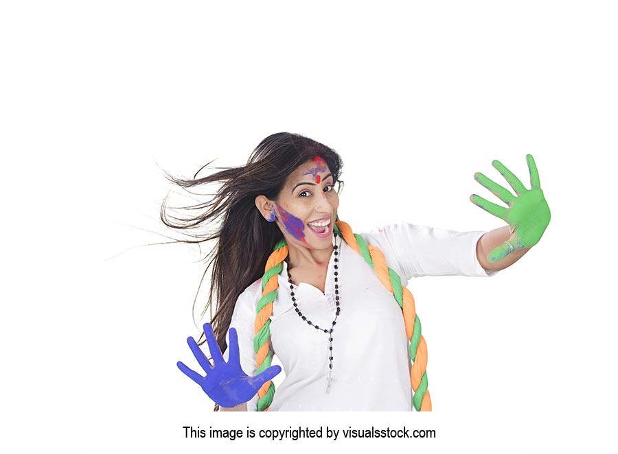 Excited Woman showing colored hands Holi Celebrati