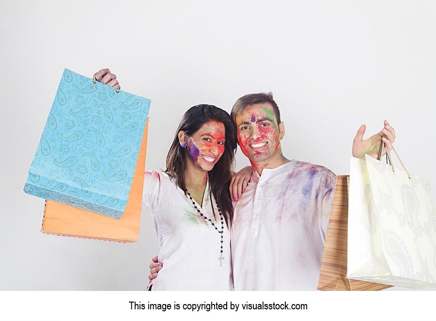 Happy Couple Holi Festival Shopping Bags Showing