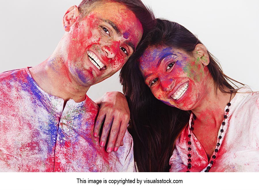 Indian Couple Holi Celebration Enjoying Smiling Co