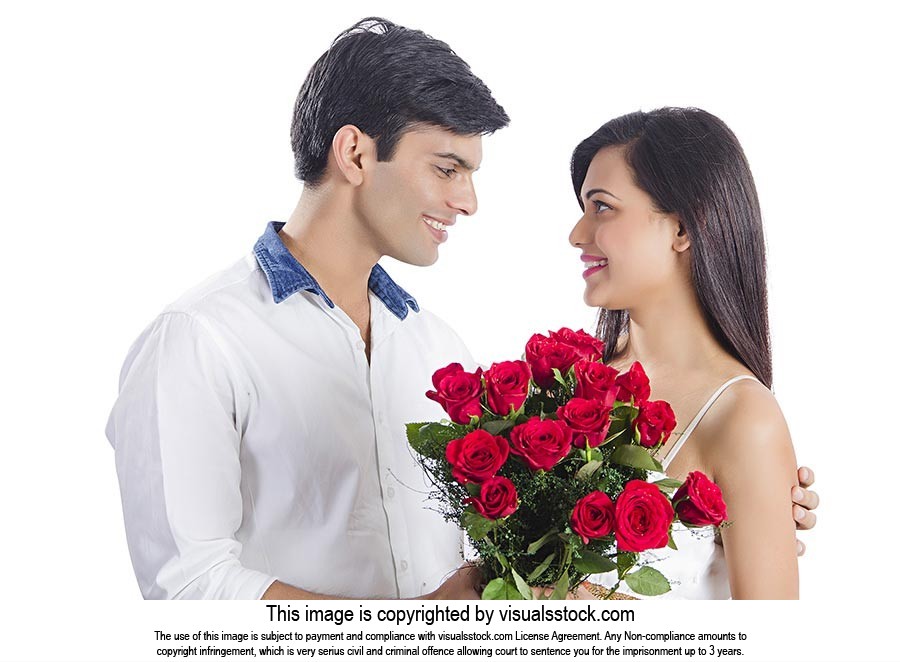 Romantic Couple Giving Flowers