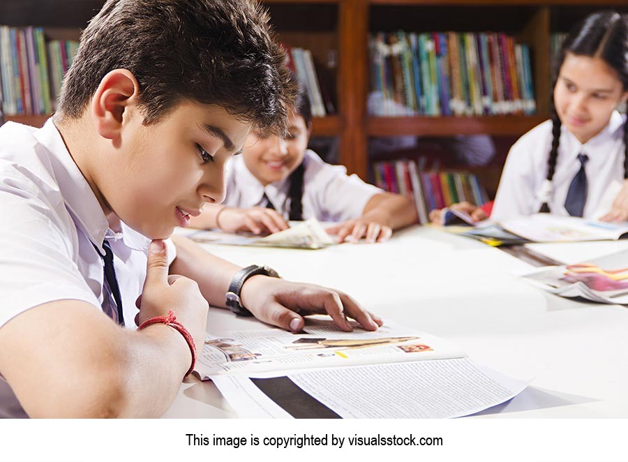 Boy Student Studying Library