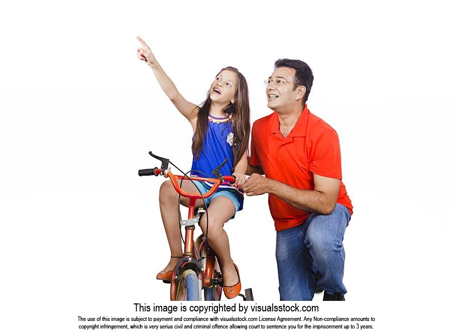 Father Teaching Daughter Ride Bicycle Pointing