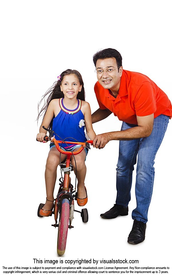 Father Teaching Daughter Ride Bicycle