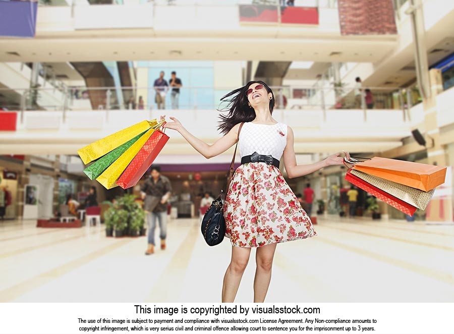 Woman Dancing Holding Shopping Bags Mall