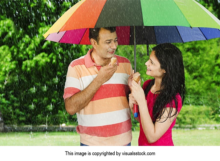 Couple Park Eating Ice cream Rain