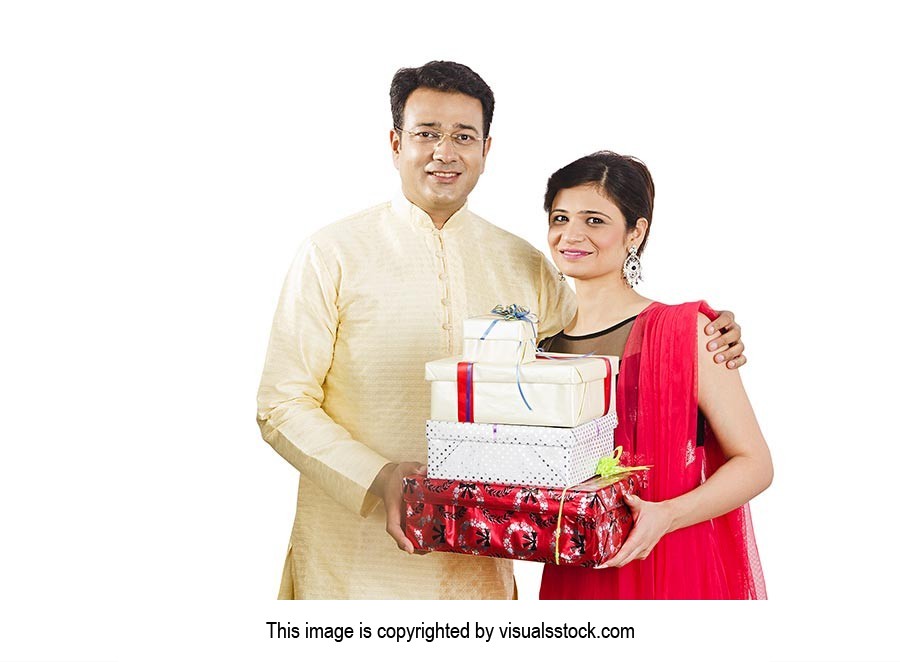 Portrait Couple Holding Gift Boxes