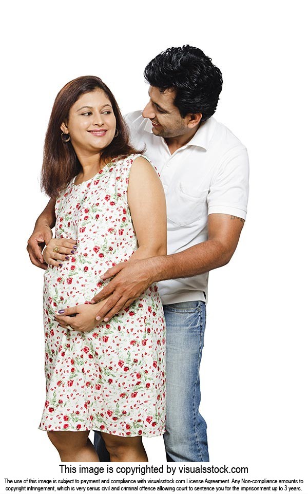 Indian Pregnant Woman And Her Husband Together Caressing Her Pregnant 