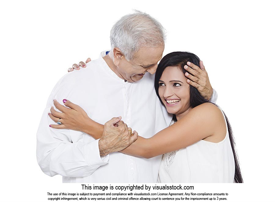 Senior Father Hugging Adult Daughter