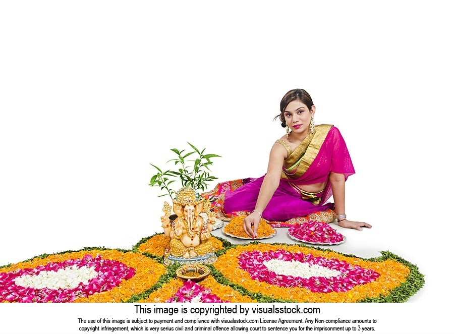 Indian Lady Decorating Rangoli Diwali