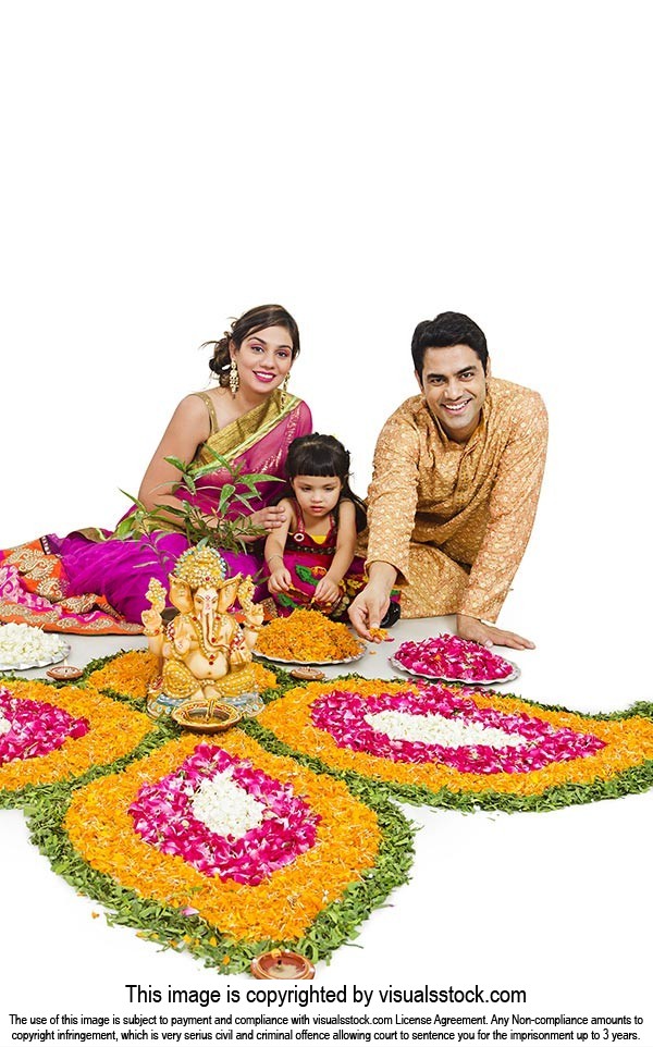Parents Daughter Making Rangol During Diwali