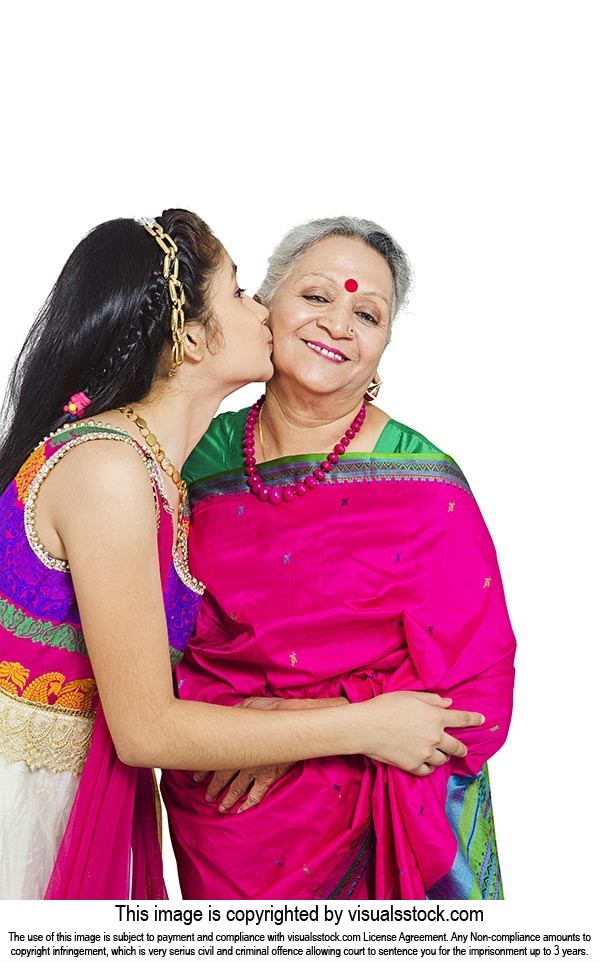 Indian Loving Granddaughter kissing Grandmother