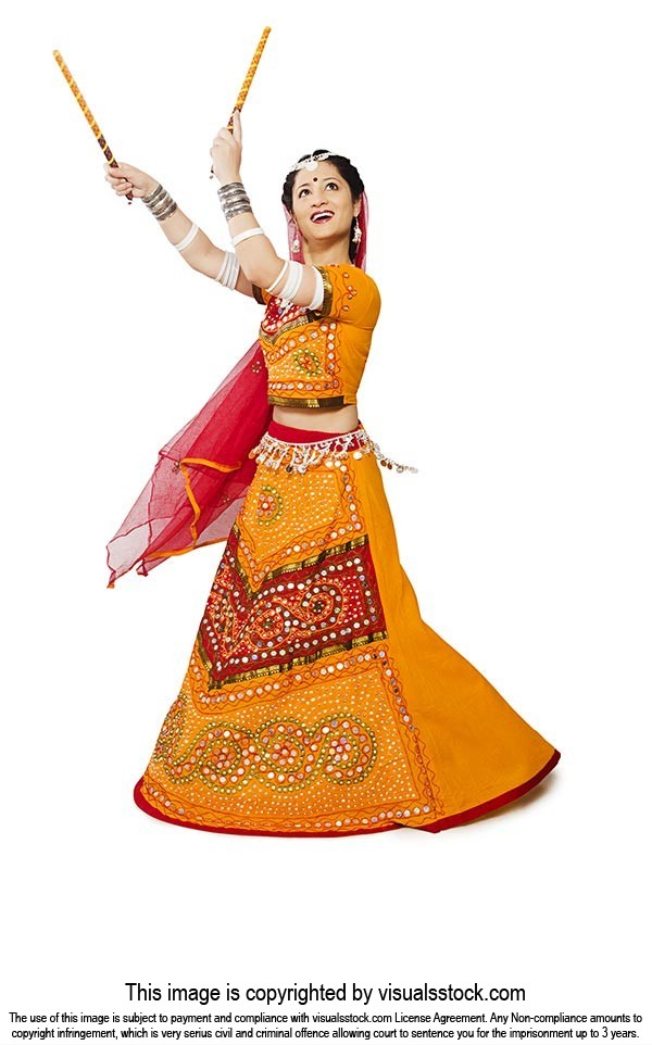 Indian Woman Performing Dandiya Raas Navratri Garb