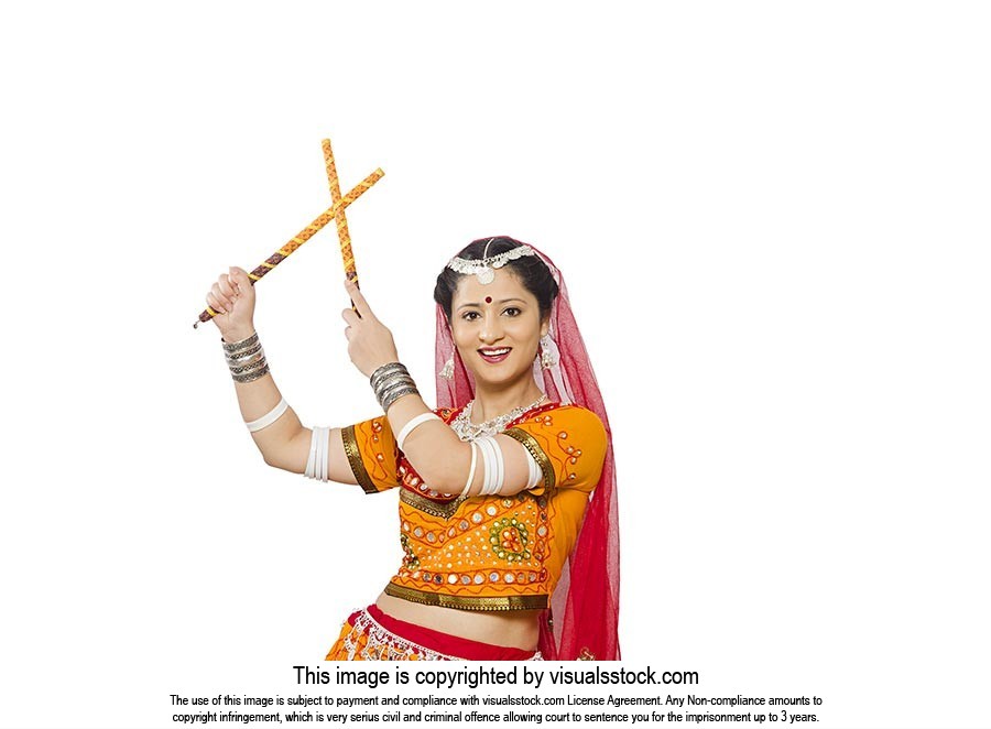 Portrait Gujarati Woman Playing Dandia Smiling