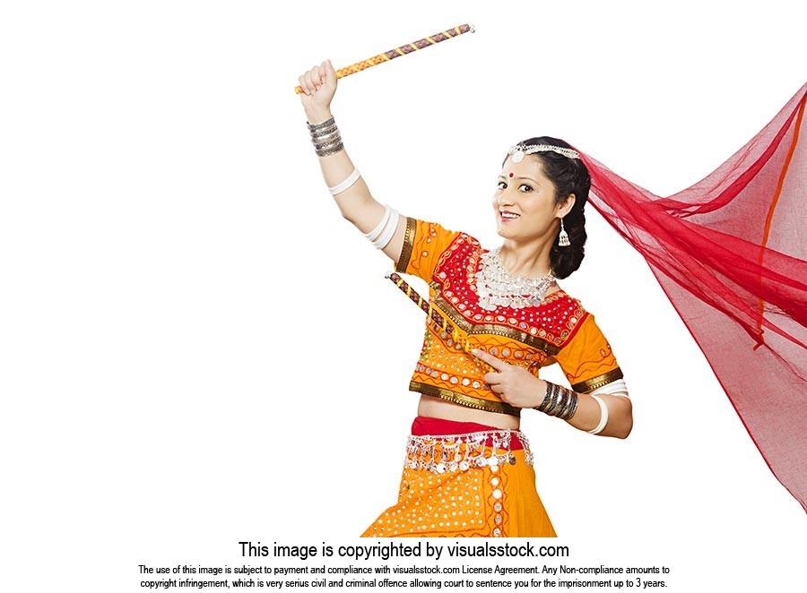 Indian Female Gujarati Performing Dandiya