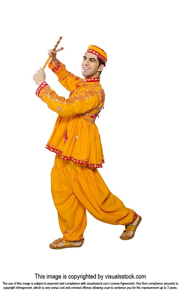 Indian Man Traditional Clothes Performing Dandia