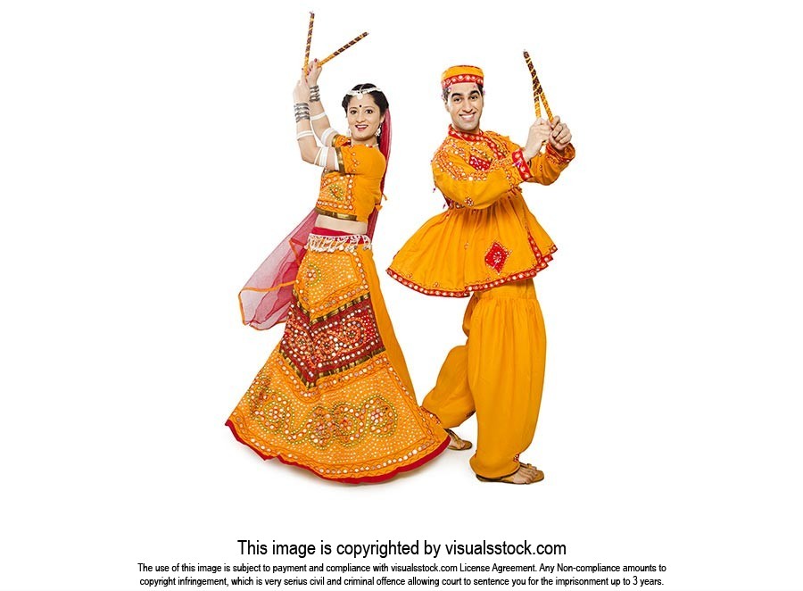 Gujrati Couple Performing Dandiya Raas Navratri