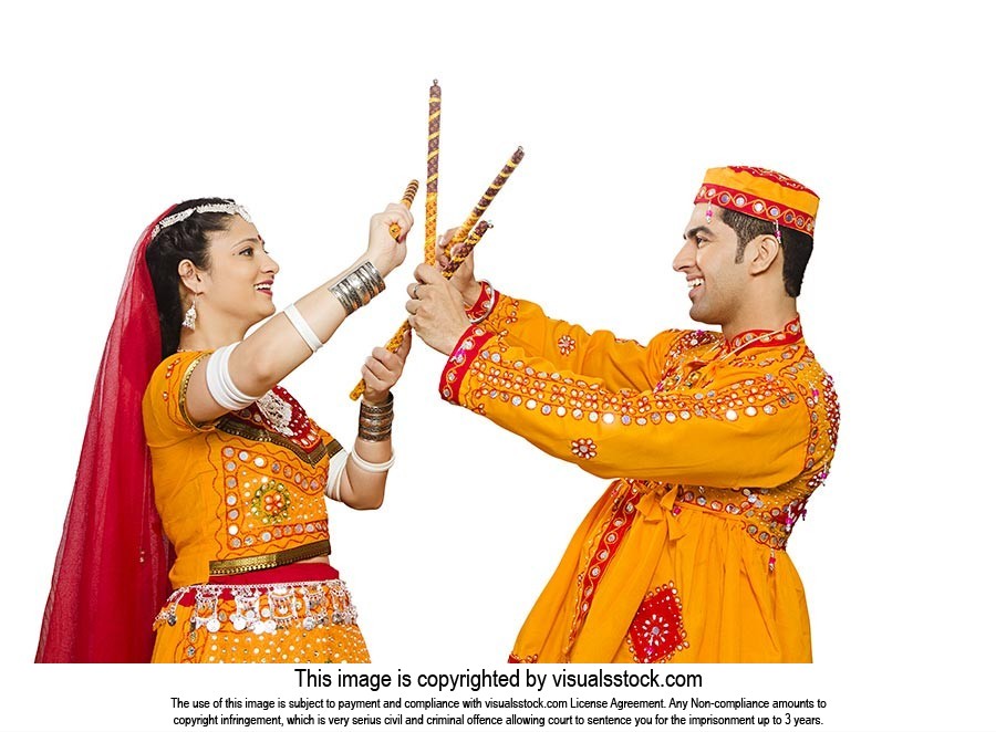 Couple Dancing Navratri Dandia Garba Festival
