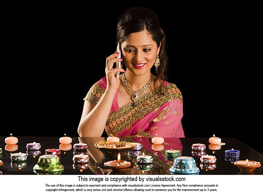 Woman Talking Mobile phone Diwali Festival