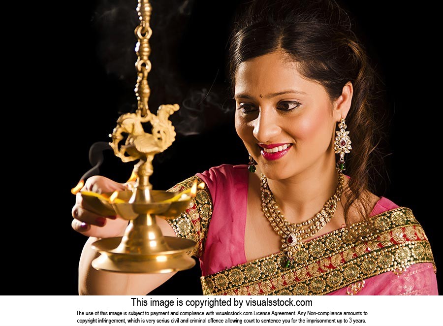 Treditional Indian Woman Burning Oil Lamp Diwali