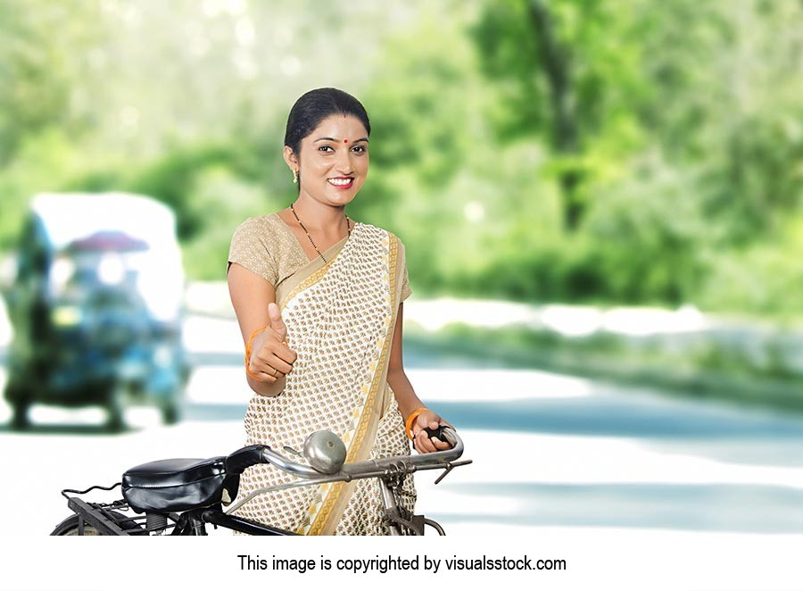 Rural Woman Road Bicycle Thumbsup