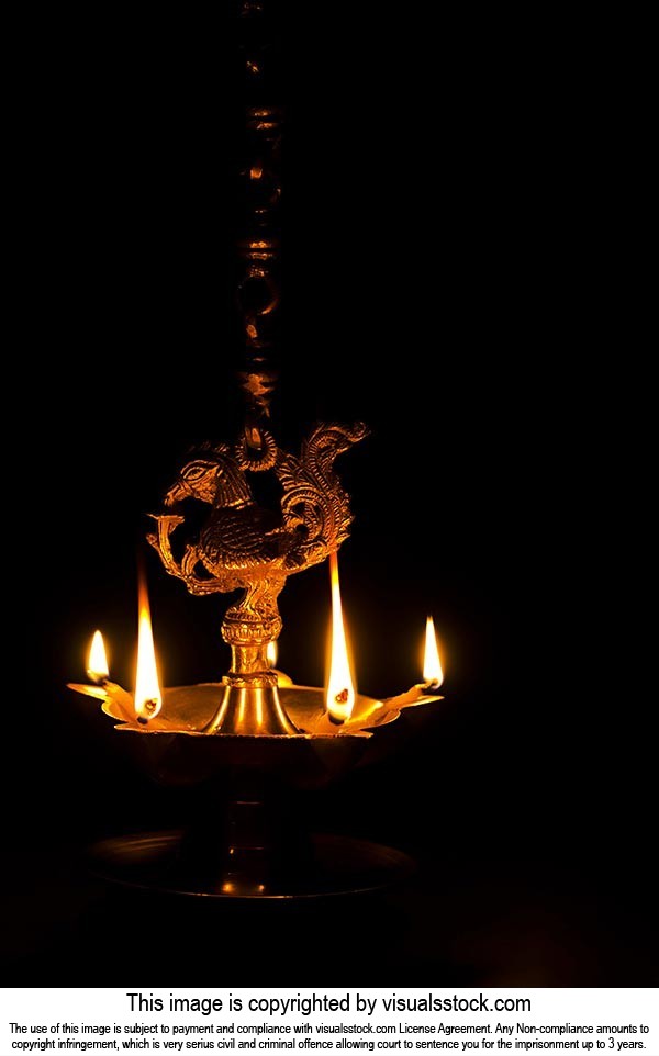 Hindu Festival Diwali Burning Diya Oil-lamp Light Illuminated on-Black  Background