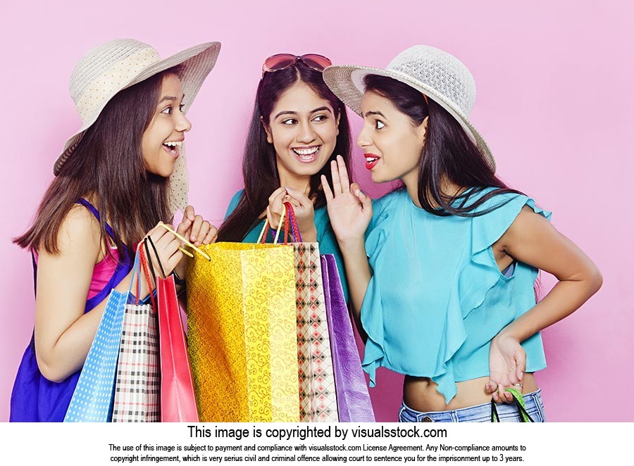 Girls Friends Opening Shopping Bag
