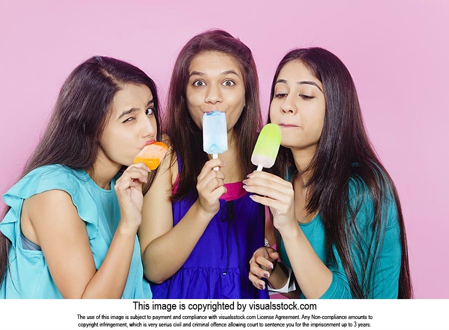 Young Girls Eating Ice cream