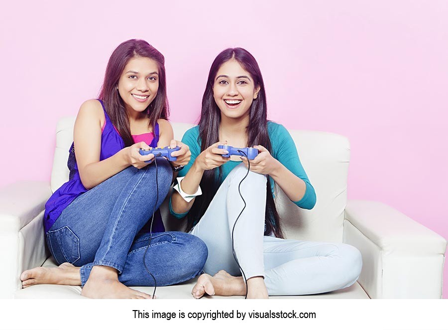 Girls Sisters Playing Video games