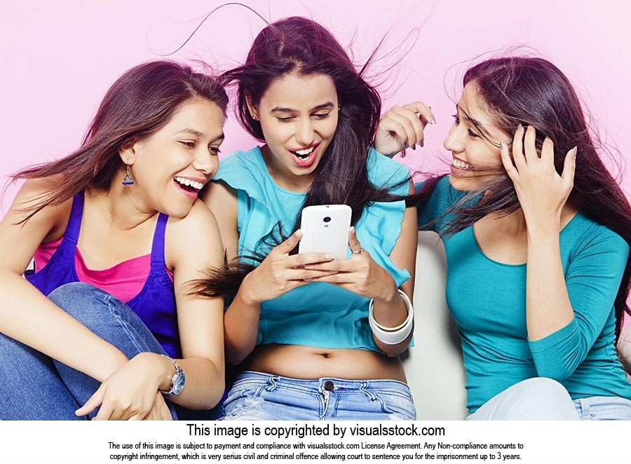 Girls Chatting Cell Phone