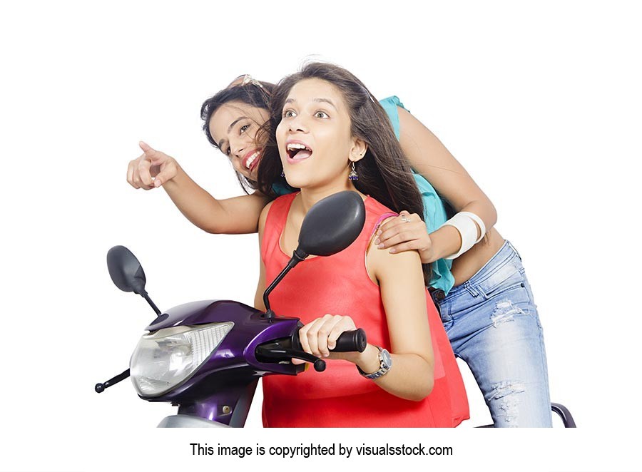 Teenage Girls Riding Scooty