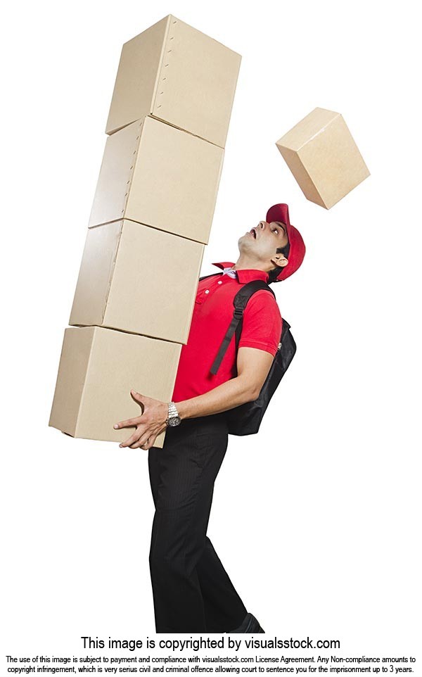 Deliveryman Holding Stack Parcels Dropping Some Th