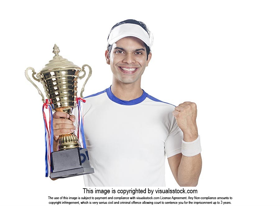 Tennis Player Celebrates Championship Trophy