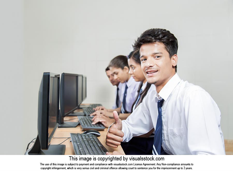 School Students Studying Computer