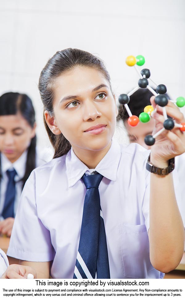 School Student Studying Atom