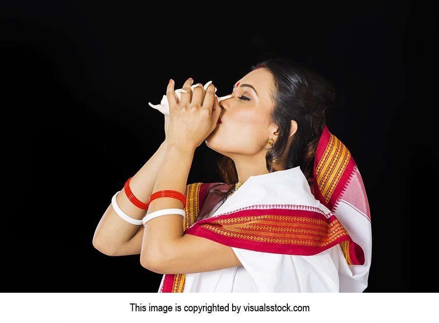 Bengali Woman Blowing Conch