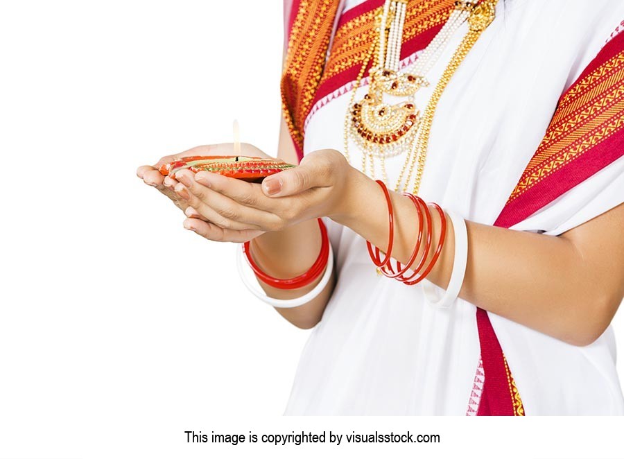 Woman Hands Holding Diya