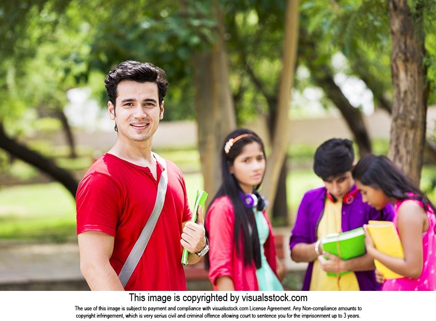 Teenager College Boy standing in the park